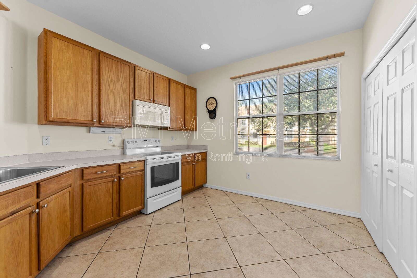 3-Bedroom Home with 2.5 Baths in Tampa's Heart - Spacious 1464 Sq Ft Gem!