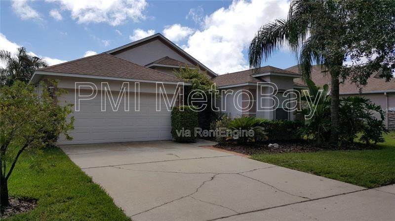 Land O’ Lakes 3/2 Home with Vaulted Ceilings, Fenced Yard, and Community Amenities property image